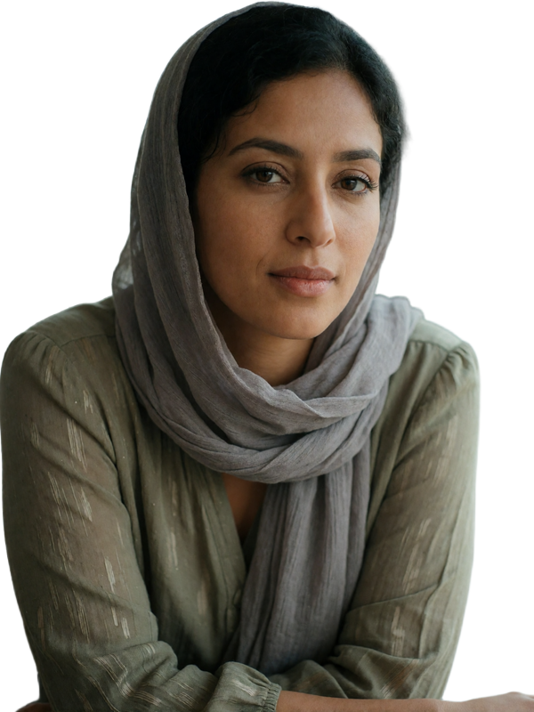 Yemeni woman in a soft grey headscarf and olive blouse with a thoughtful expression